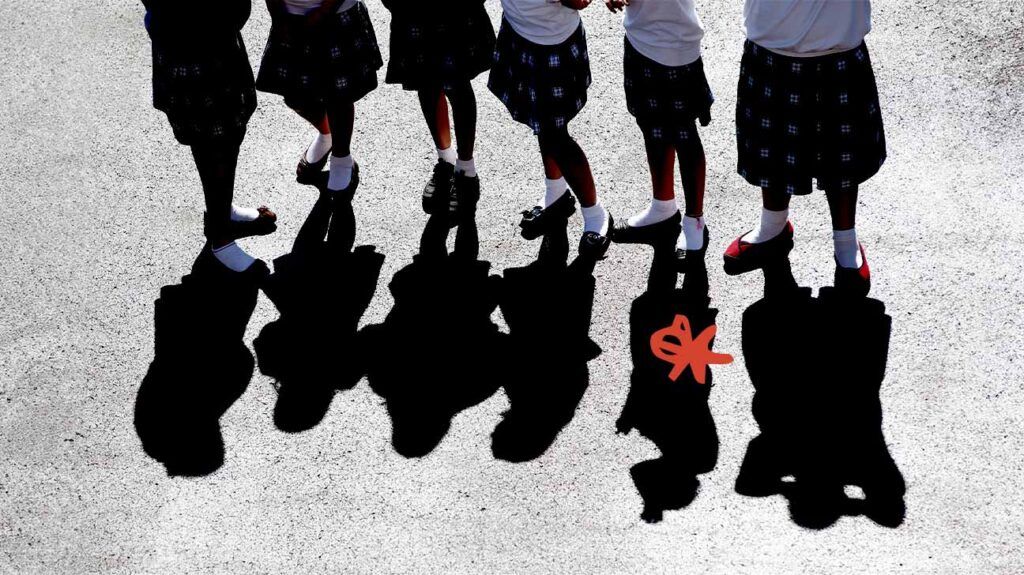 Shadows of school children in a row