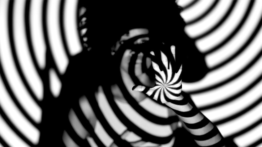 Spiraling shadows over a person with anxiety and avoidance behaviors.-1