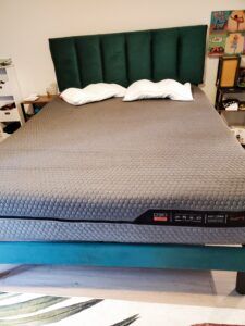 Photo of Layla hybrid mattress on bed frame.