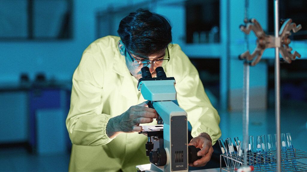 A scientist using a microscope-2.