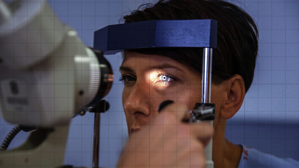 A person undergoing an eye exam to diagnose the stage of their macular hole.-2