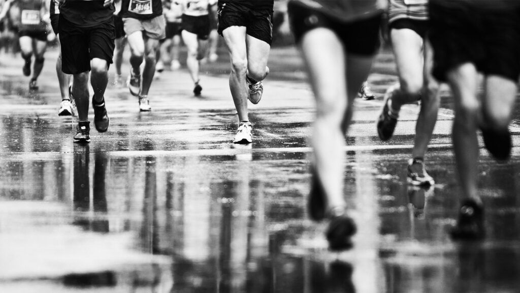 Black and white image of marathon runners
