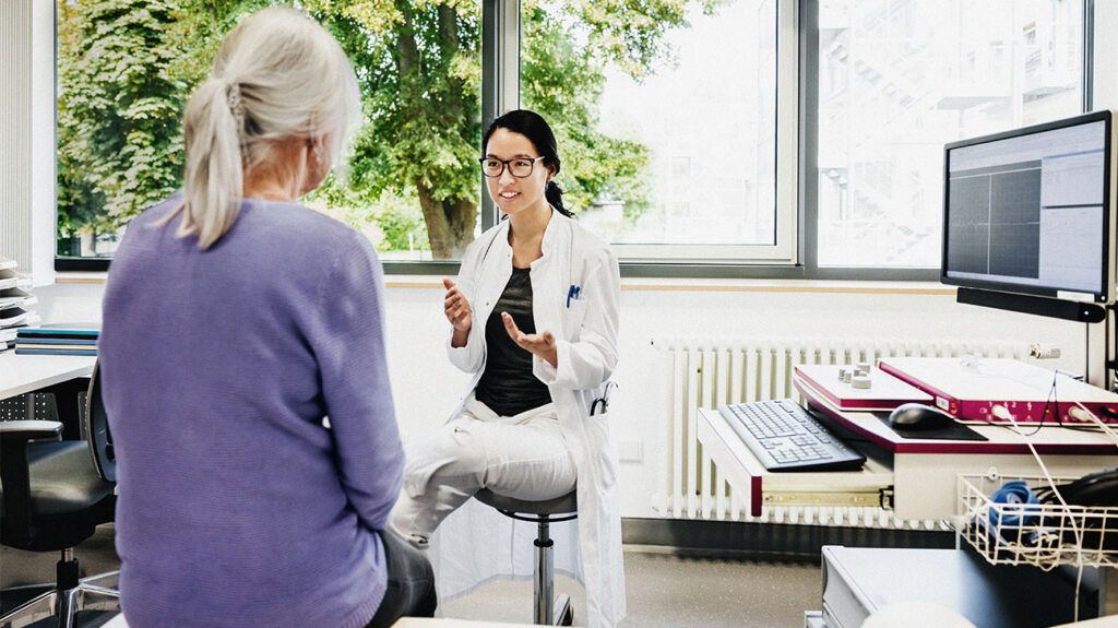 A doctor is talking with a patient.