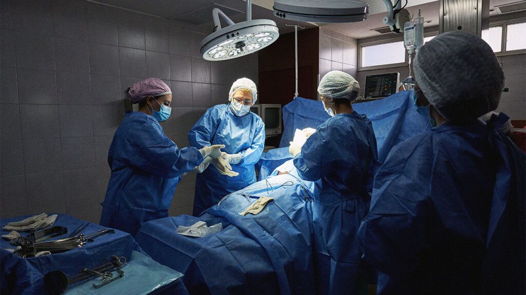 Multiple doctors in a surgical procedure