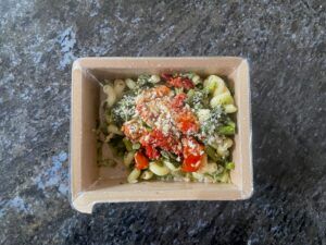 Mosaic food meal delivery kit in packaging pesto pasta