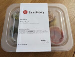 Territory meal delivery kit in plastic packaging on kitchen countertop