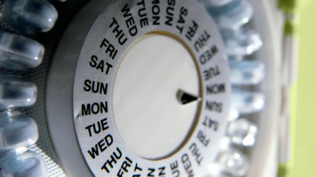 a wheel showing the days of the week as a reminder for birth control pills