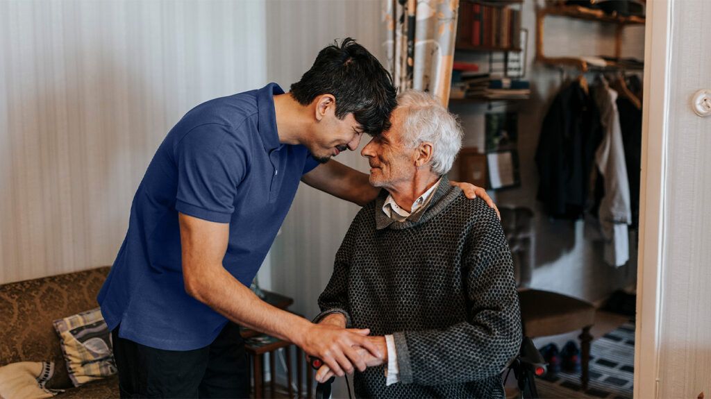 A carer looking after an older adult with dementia and a UTI.