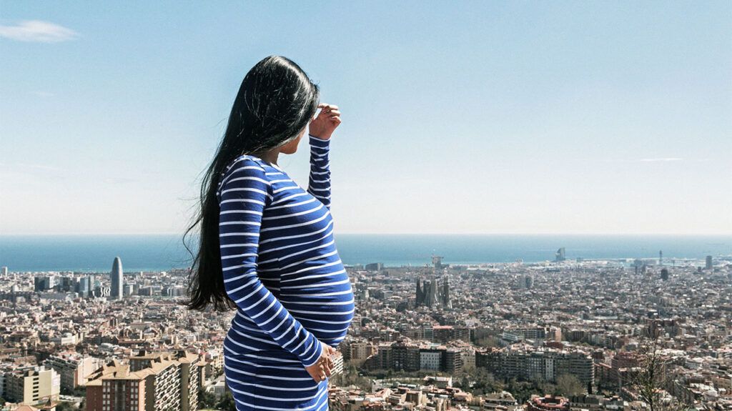 pregnant person looking over the skyline