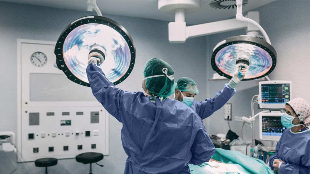 A surgeon in preparing an operating room for a ventricular resection procedure.-1