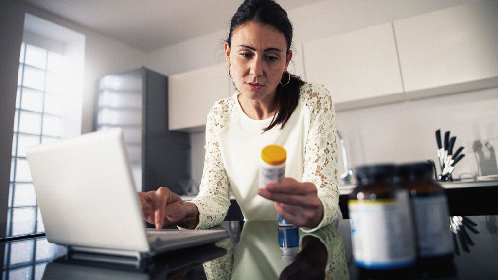 Female filling a prescription online