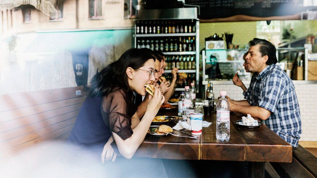 People eating a meal at a table 1