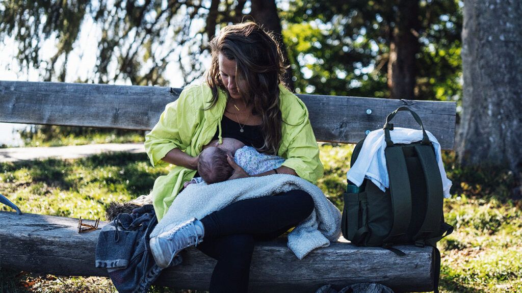 A woman nursing after breast cancer.