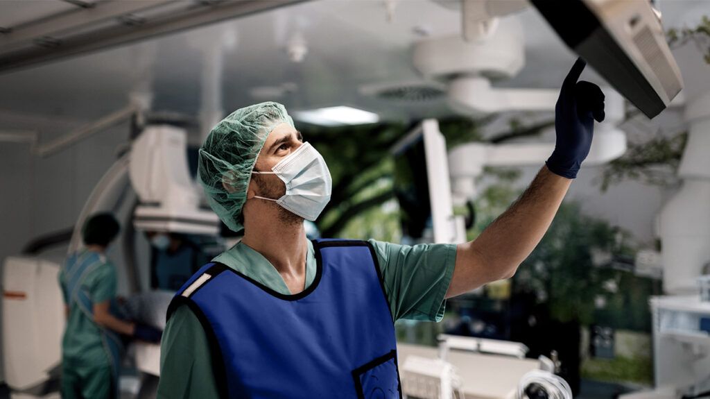 A surgeon at work using a touch monitor-1.