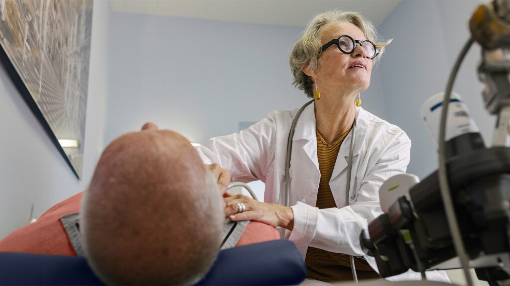 Healthcare professional performing an ultrasound