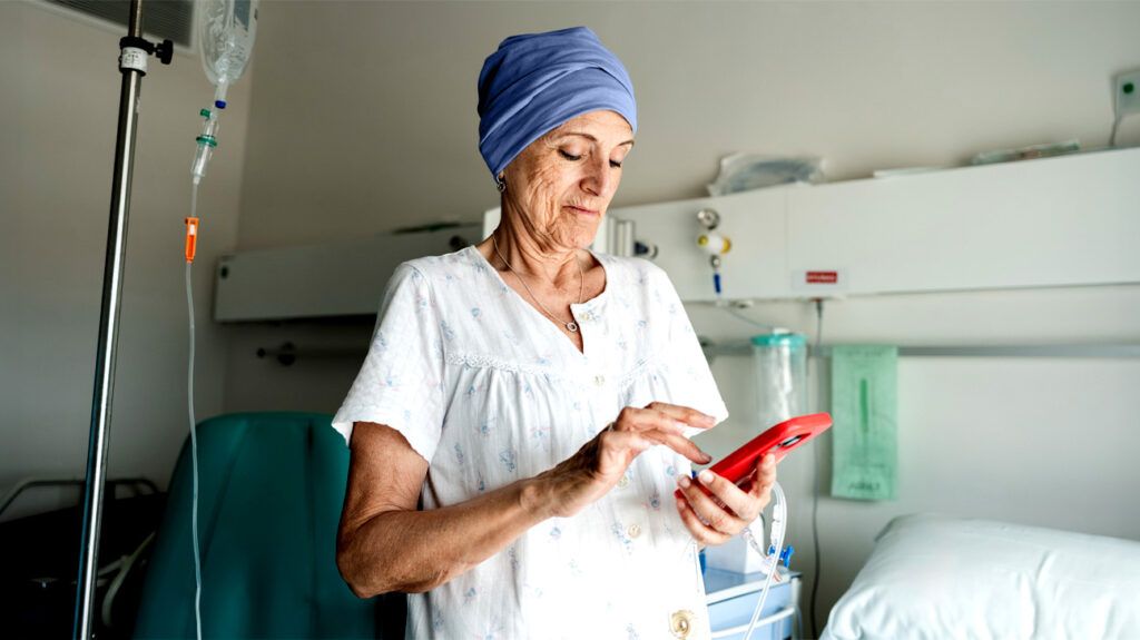 A healthcare professional texting on a cellphone 1