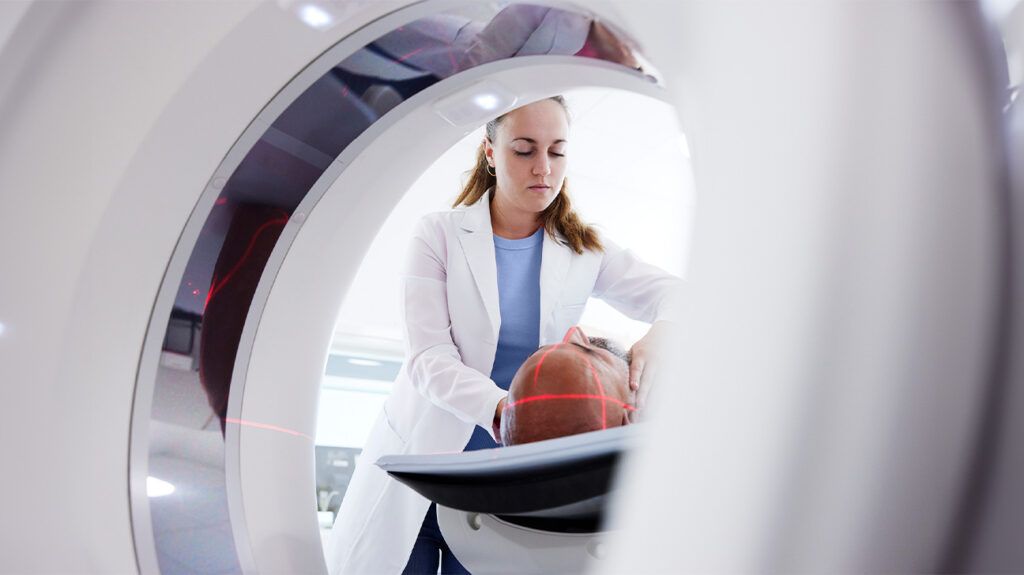 Person undergoing a PET scan