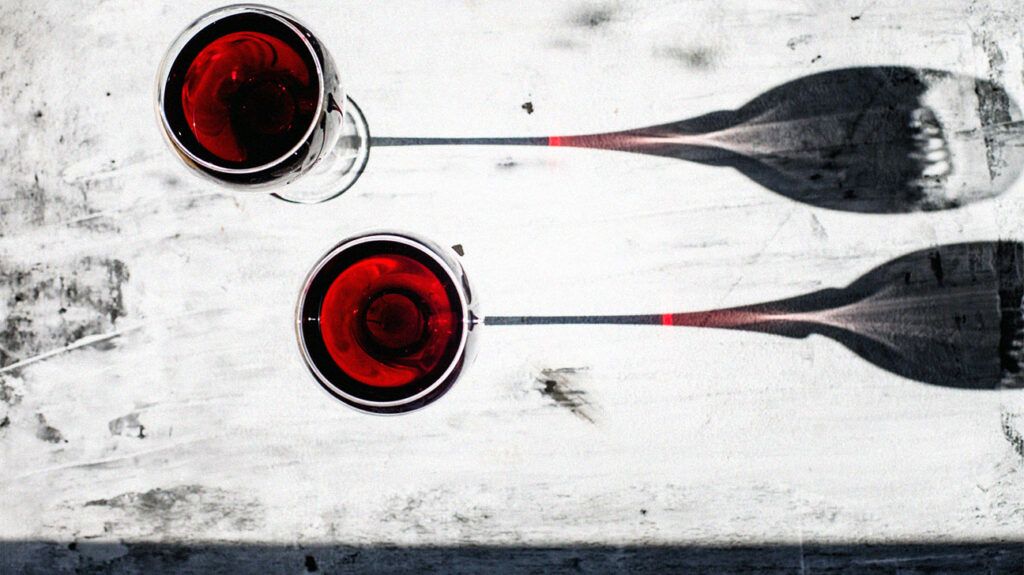 two glasses of red wine seen from above