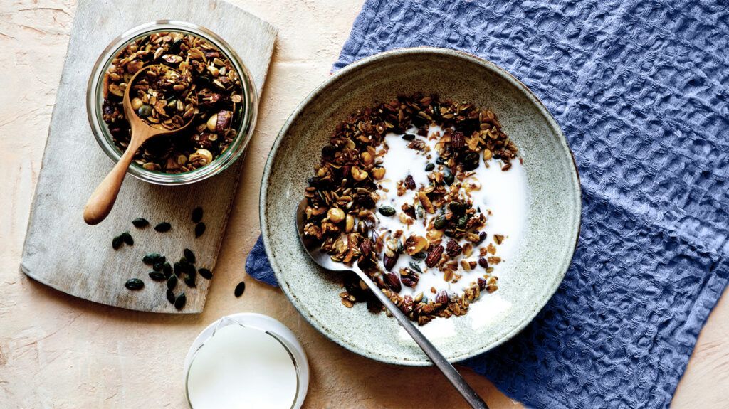 dried fruit, nuts, seeds, and milk bowl