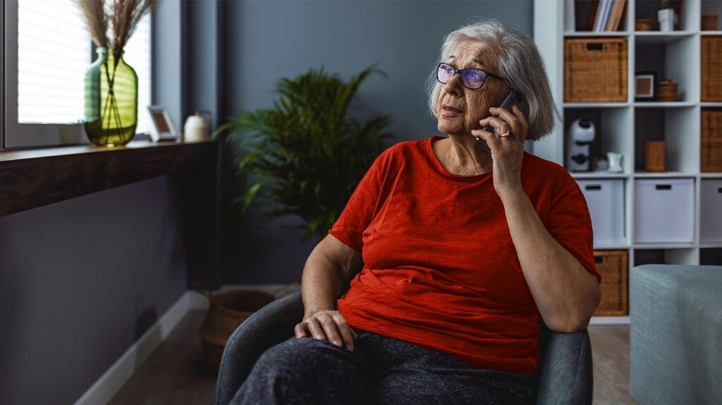 Female over 65 speaking on the phone