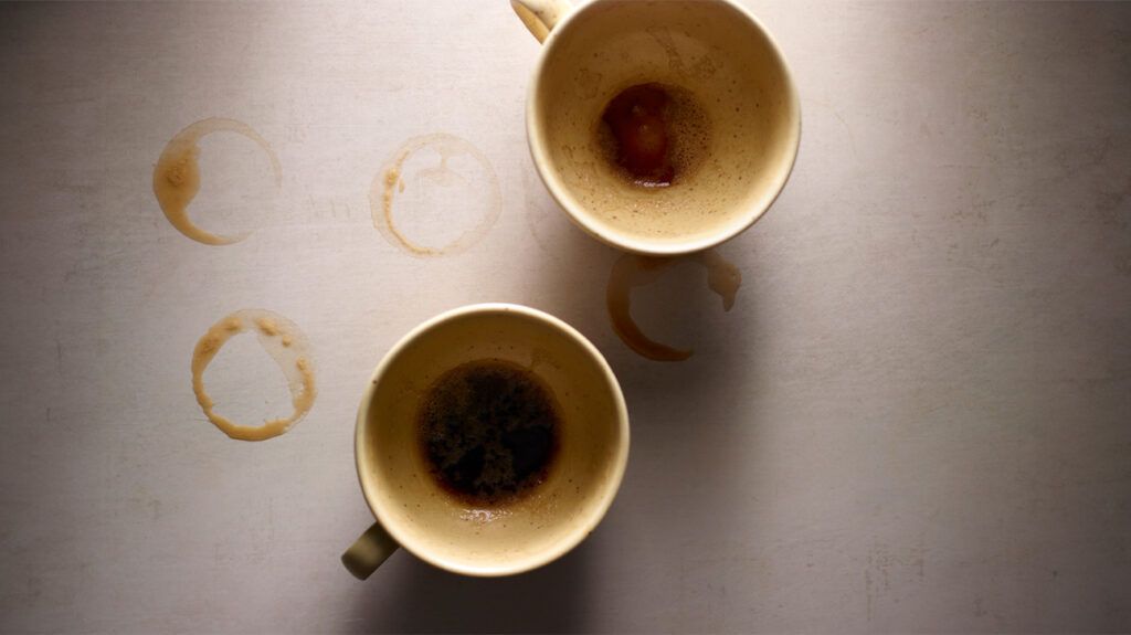 two empty coffee mugs seen from above