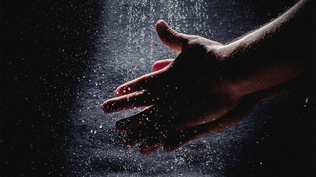 Hands Washing Under Water Stream