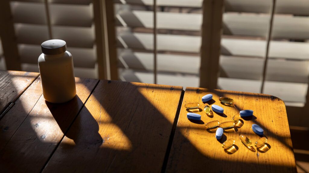 Supplements spread out on a table 1