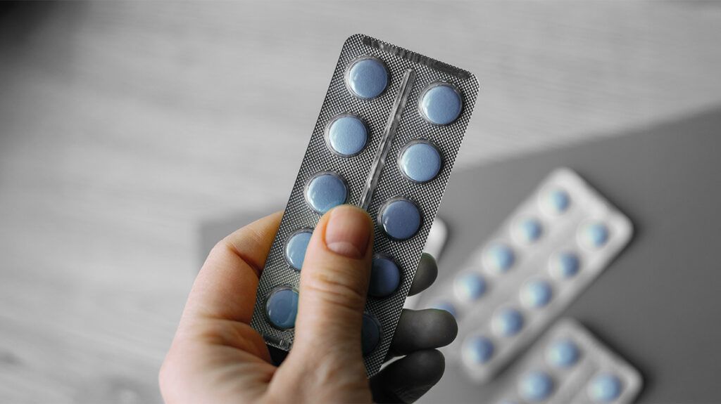 Blister pack in a persons hand 1