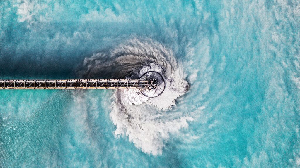 Ariel image of water swirling in a water treatment pool.-2