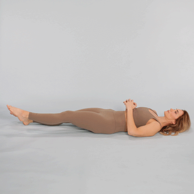 A person performing a knee lift