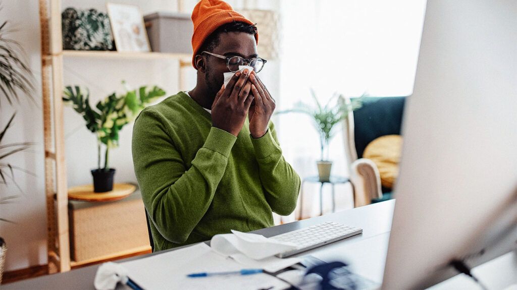 A person blowing their nose 1