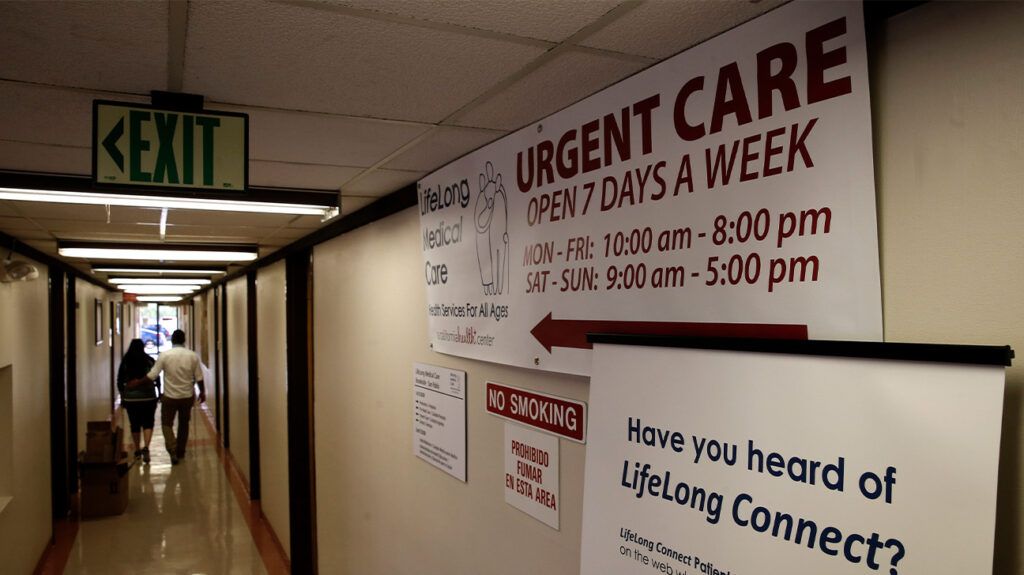 Signs pointing to an urgent care clinic