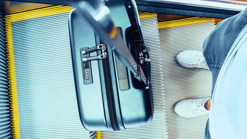 A person with a cabin suitcase-2.