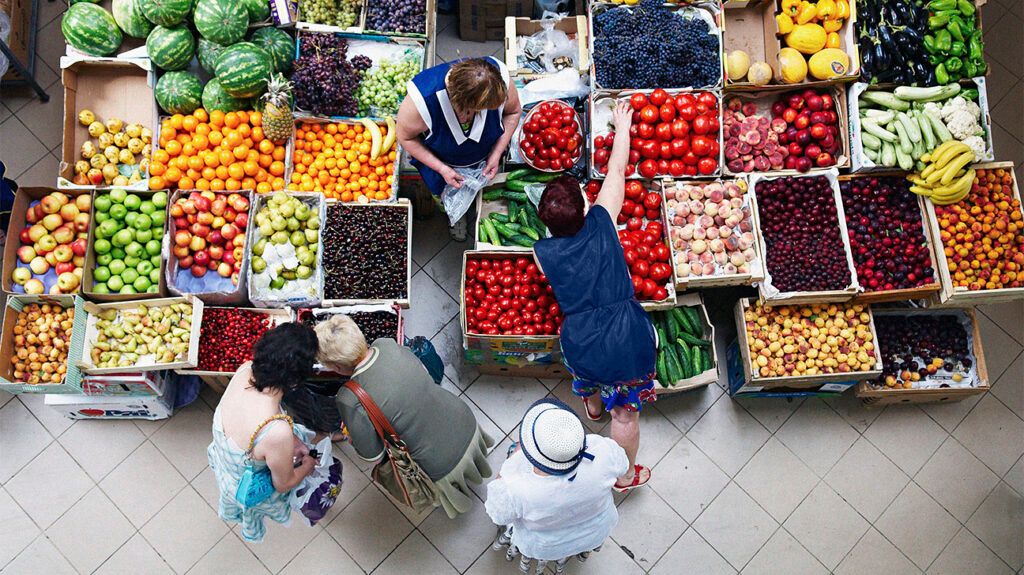 Aerial shot of a food stall with lots of fruit in crates.-2