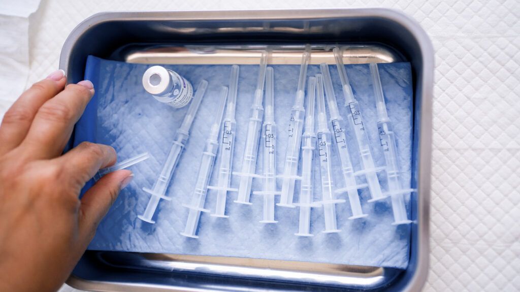 Shingles vaccines on a metal tray