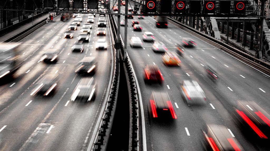 Blurry cars on a busy highway
