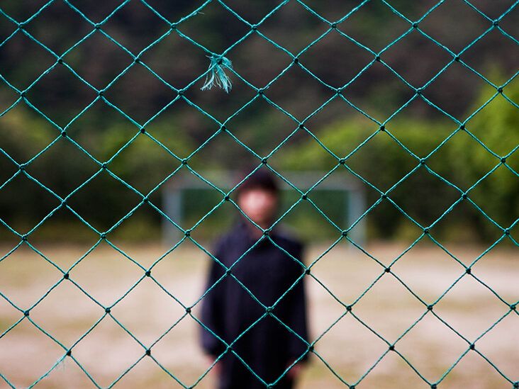 https://media.post.rvohealth.io/wp-content/uploads/sites/4/2021/02/woman-blur-standing-behind-fence-net-732x549-thumbnail-732x549.jpg