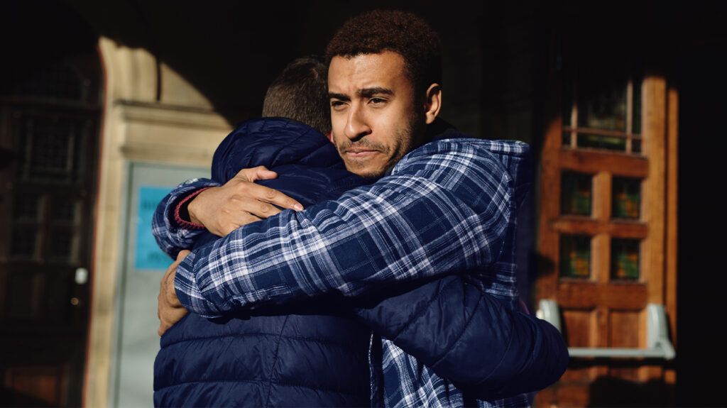 Young man showing empathy for a friend