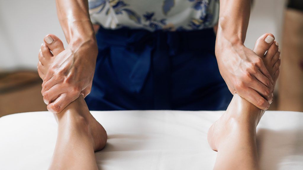 https://media.post.rvohealth.io/wp-content/uploads/sites/4/2021/05/foot-massage-essential-oil-feet-arms-1296x728-header-1024x575.jpg