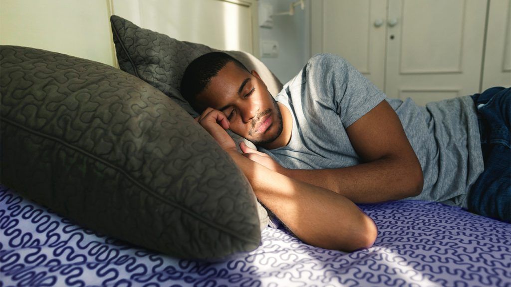 Man napping, drifting into deeper sleep stage