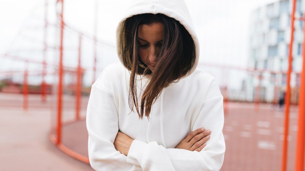 young woman looking thoughtful