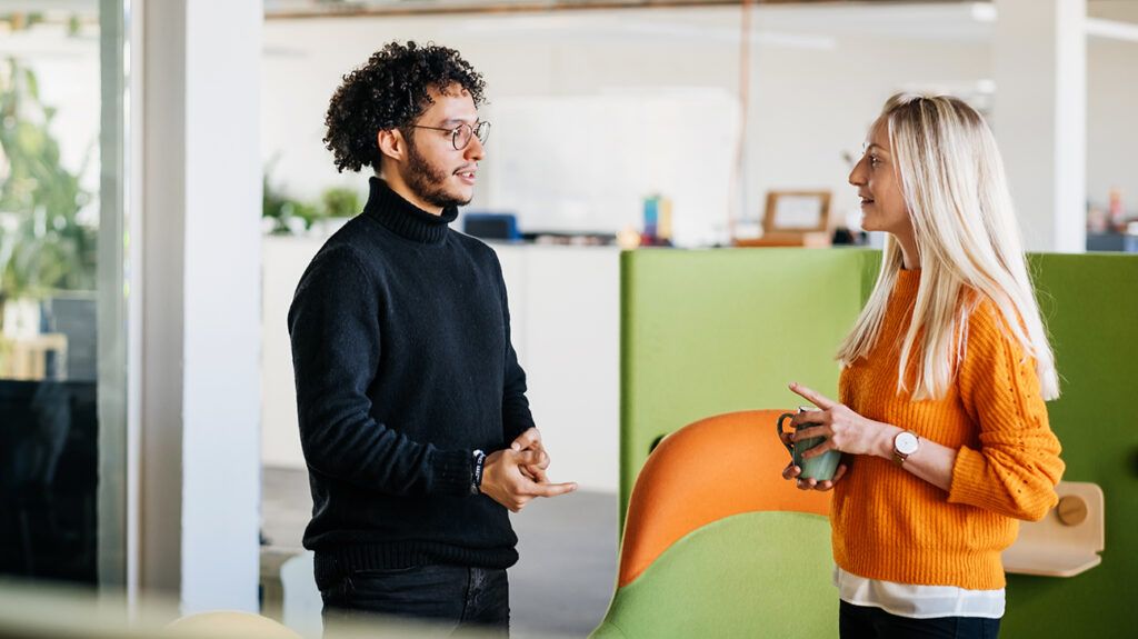 Colleagues at work talking 