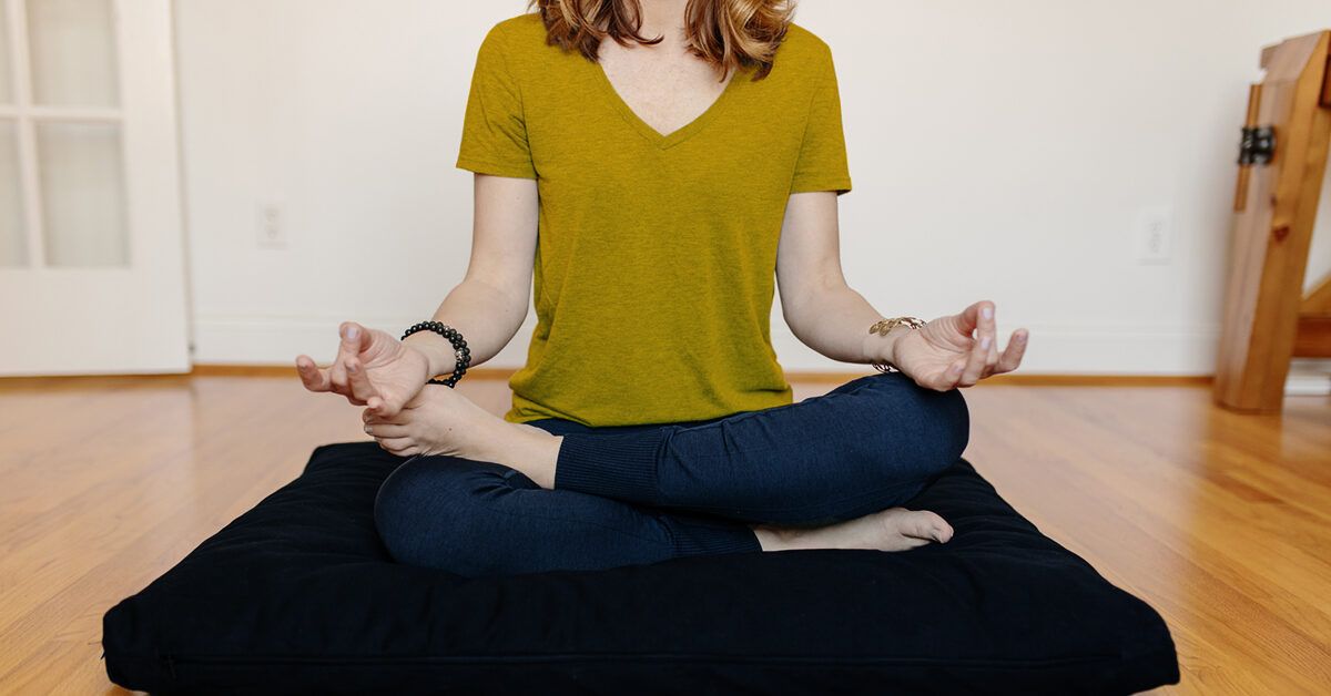 https://media.post.rvohealth.io/wp-content/uploads/sites/4/2021/08/cropped-woman-sitting-cross-legged-meditating-pillow-1200x628-facebook-1200x628.jpg
