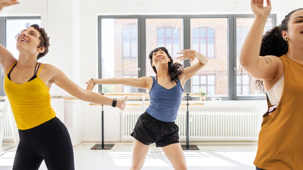 Women enjoying dance movement therapy