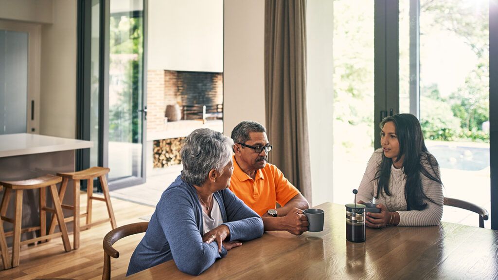 Parents speaking with their daughter about their disapproval of her new romantic partner