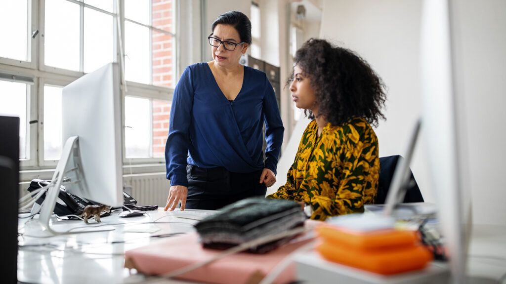 A manager using positive punishment with an employee in the form of micromanaging