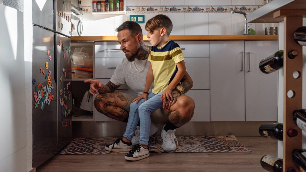 https://media.post.rvohealth.io/wp-content/uploads/sites/4/2021/09/father-son-talking-letters-fridge-kitchen-1296x728-header-1024x575.jpg