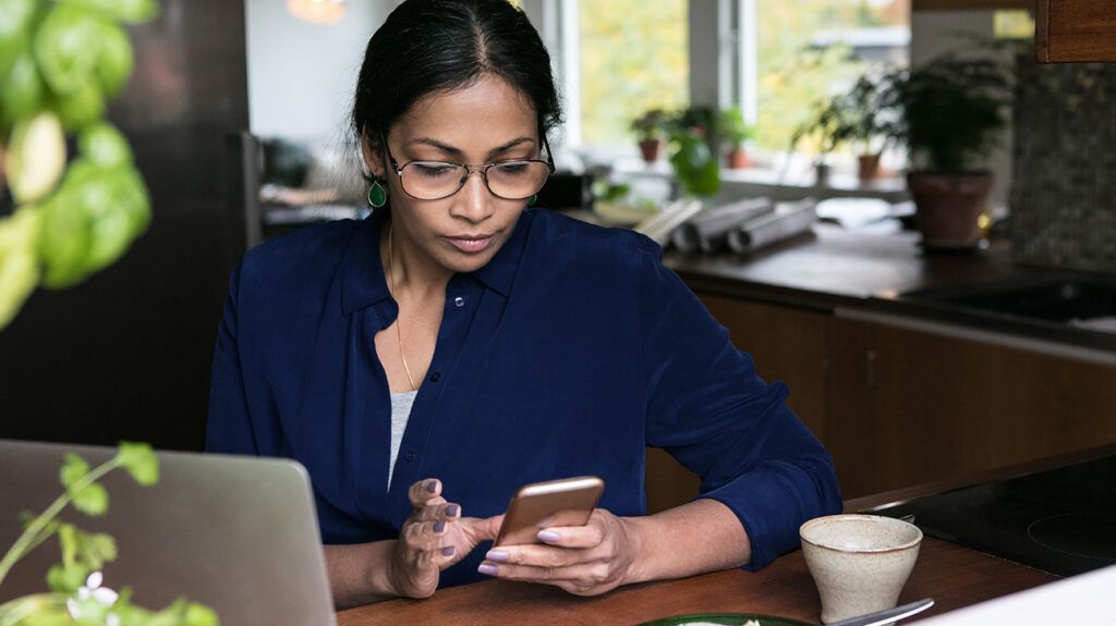 Woman doing research on her phone