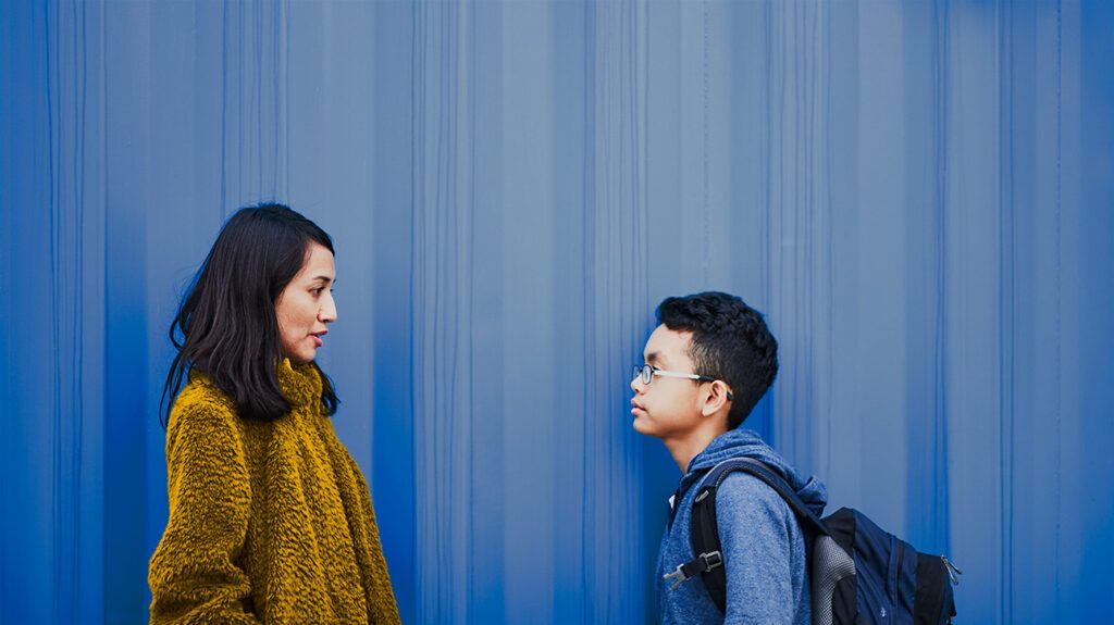 Mother talking to son