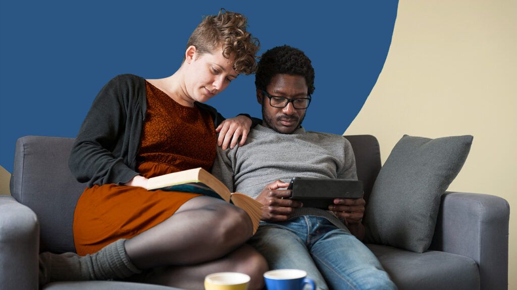 Two sapiosexuals reading on a couch